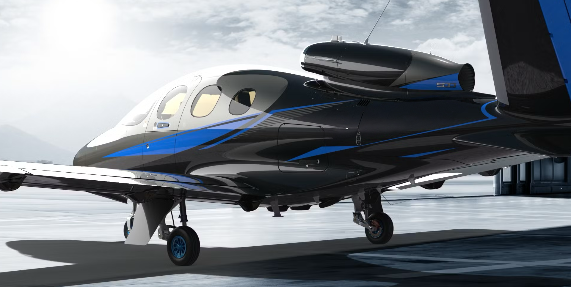 Cirrus Vision Jet in black and blue livery, parked on the ramp