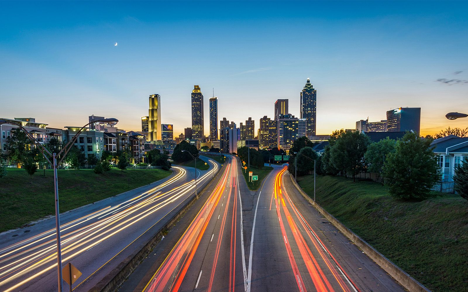 Atlanta skyline at dusk with light trails