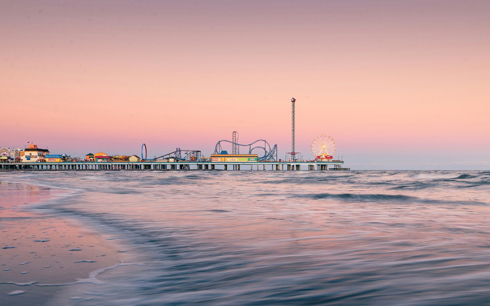 Galveston Island Historic Pleasure Pier at dusk