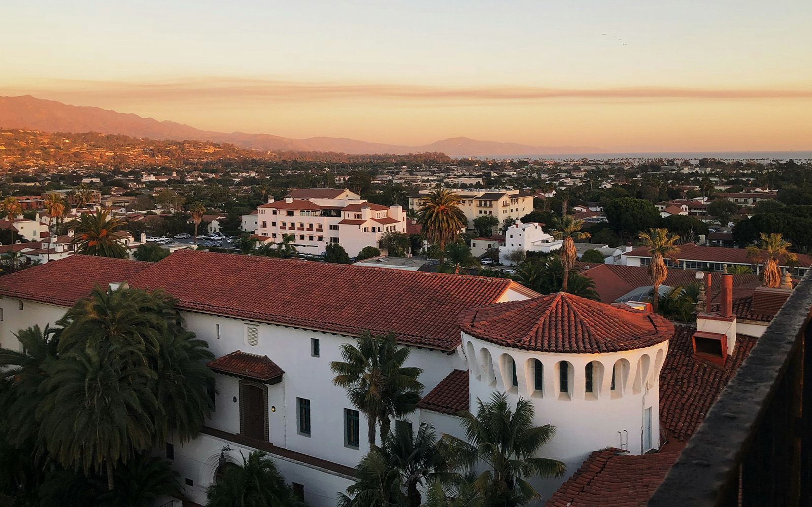 Santa Barbara rooftops and mountains at sunset
