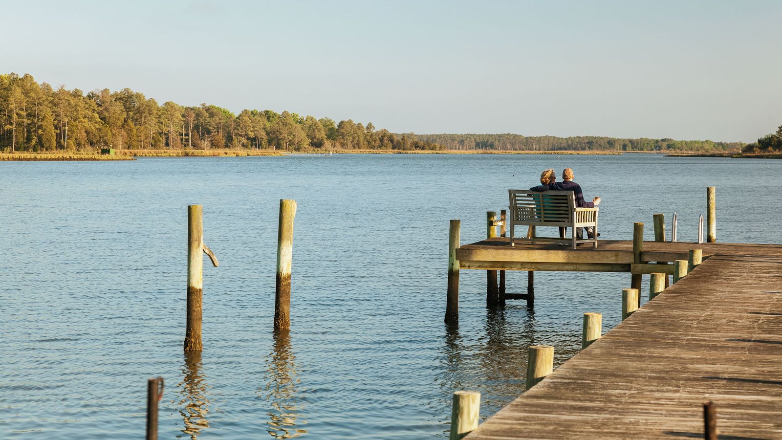 Guests relaxing on the dock overlooking the Severn River